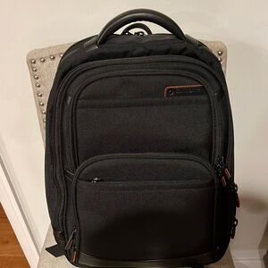 All black Samsonite backpack with laptop section